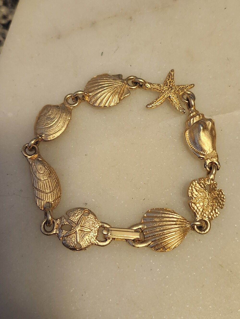 Gold Tone Seashell Beach Themed Charm Bracelet